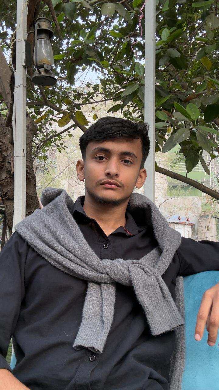 Alshan Rijal working at desk